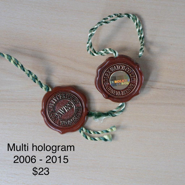 Original Rolex Red hang tags with multi hologram