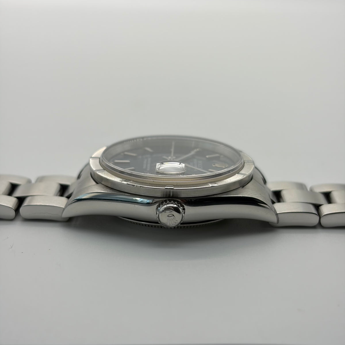 Rolex 15210 Oyster Perpetual Date "Blue Dial, Engine Turned Bezel"