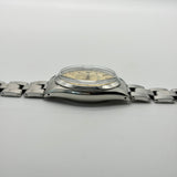 Rolex 1500 Oyster Perpetual Date " Champagne Dial"