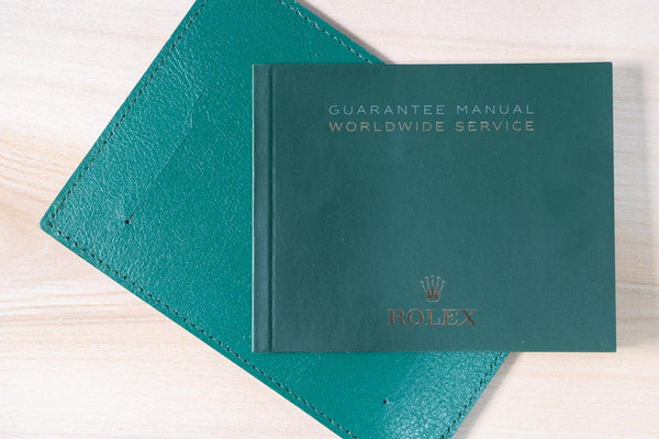 Original Rolex Guarantee manual with card sleeve (current model).