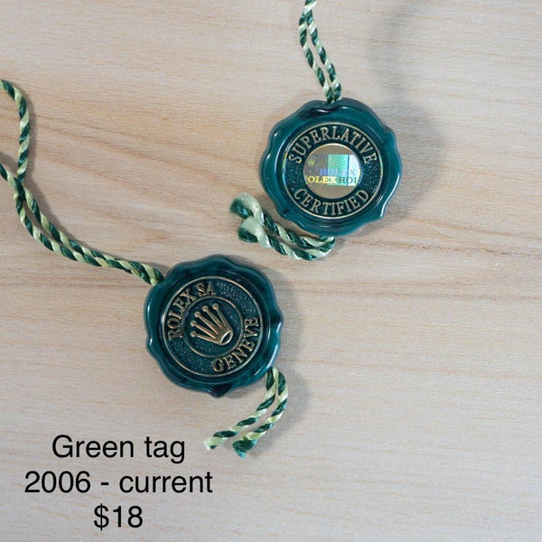 Original Rolex Green hang tags. Martin Luxury