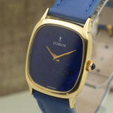 Corum " Lapis Dial" in 18K Yellow Gold