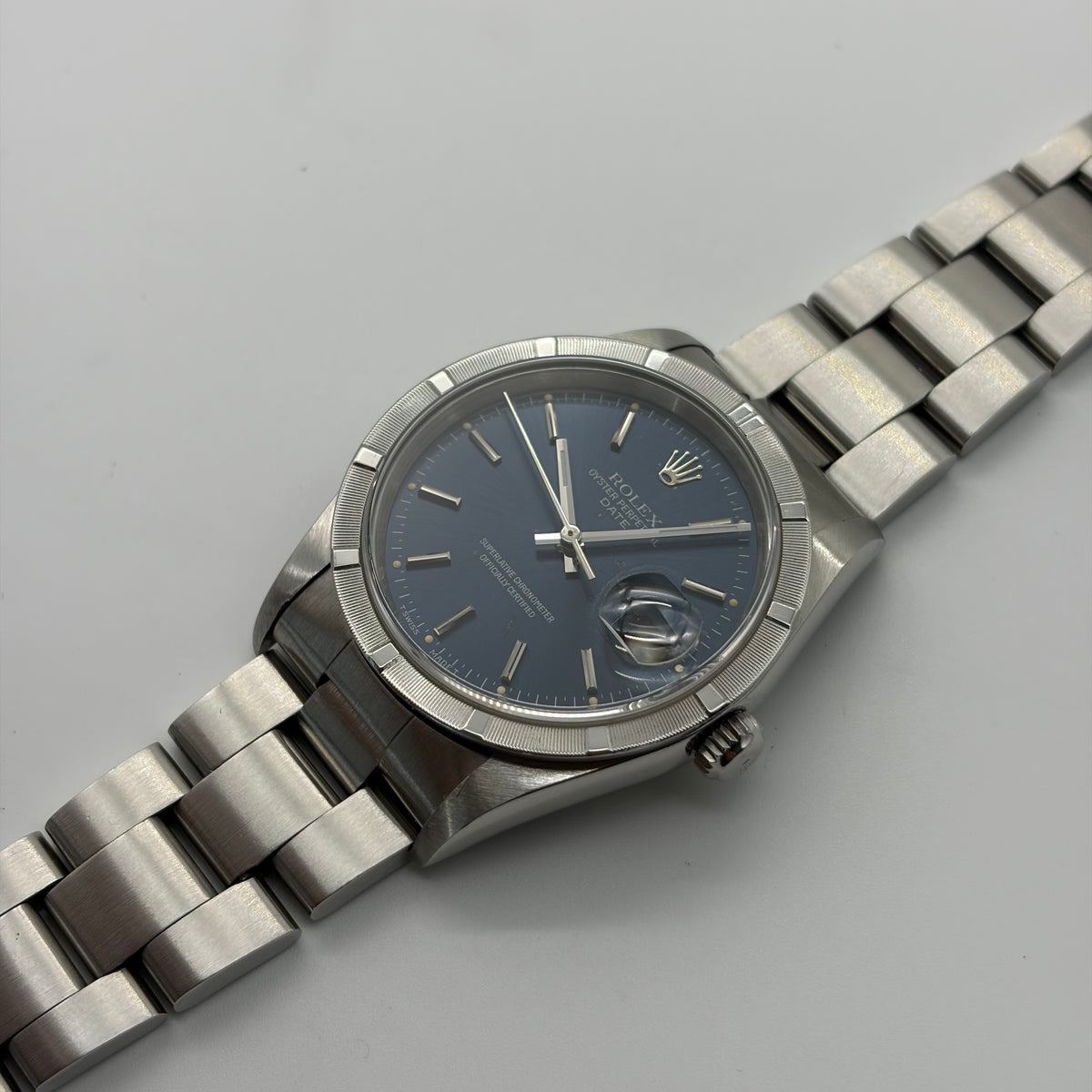 Rolex 15210 Oyster Perpetual Date "Blue Dial, Engine Turned Bezel"