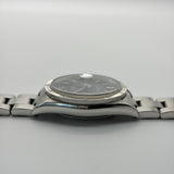 Rolex 15210 Oyster Perpetual Date "Blue Dial, Engine Turned Bezel"