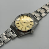 Rolex 1500 Oyster Perpetual Date " Champagne Dial"